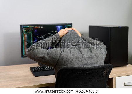 frustrated gamer playing video games - stock photo