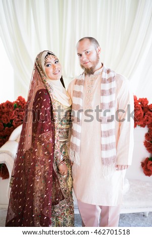 Happy bride and groom on their wedding. Malay wedding. Asian Wedding. Selective focus. Toned image.