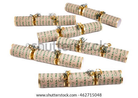 A studio shot of Christmas Crackers - otherwise known as Bon Bons. A traditional cracker consists of a cardboard tube wrapped in a brightly decorated twist of paper with a gift in the central chamber.