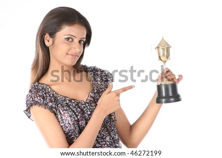 picture of an attractive college girl winning a gold trophy