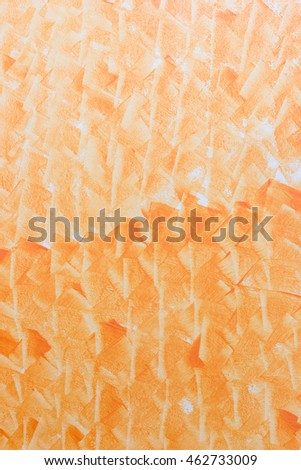 Abstract art orange color paint in cement wall, vertical pattern background.
