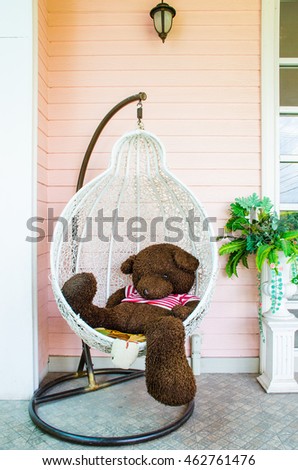 Romantic of Big Stuffed animals Brown Bear Sitting on a comfy white basket