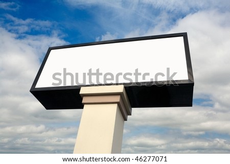 Blank commercial billboard against cloudy sky
