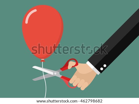 Big hand cutting balloon string with scissors. Business concept