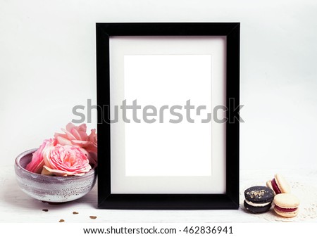 Mock up with frame, pink roses and french macarons