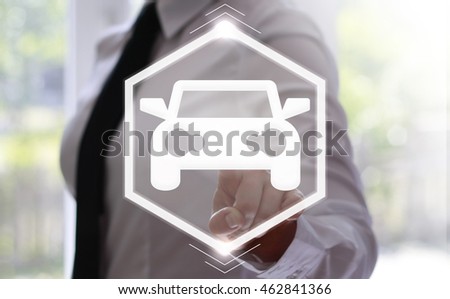 businessman clicks on icon of car in a hexagon on a virtual screen. Businesswoman in white shirt, tie touching vehicle button. Showroom, dealer center, buy, business, purchase, sale, internet, concept