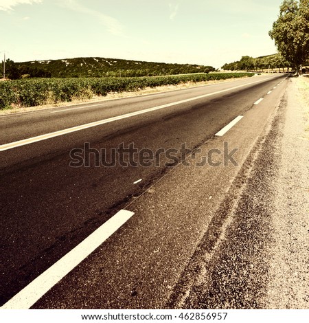Winding Paved Road near Vineyard in France, Vintage Style Toned Picture