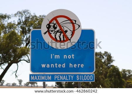 An Australian Road Sign along the Sturt Highway warning that taking fruit in to the area or interstate is prohibited due to the risk of fruit fly infestation ruining crops.