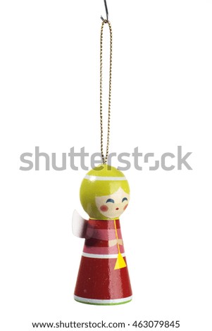 Christmas tree red angel toy isolated over a white background.
