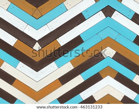 Colorful wood texture with modern geometric pattern in vintage color. Geometric background.