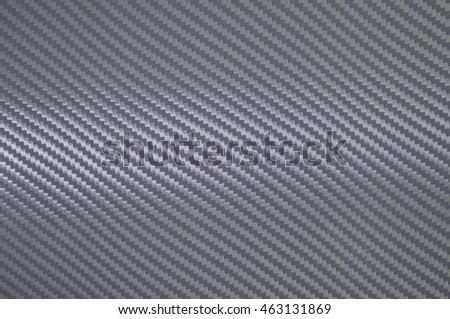 Carbon texture. Metalic background with spotlight. modern material. pattern
