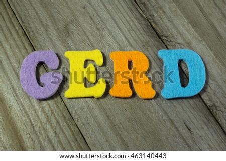 GERD (Gastroesophageal Reflux Disease) medical concept on wooden Royalty-Free Stock Photo #463140443