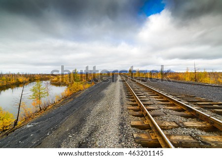 Railway track. Late autumn in the Arctic tundra. The northernmost railway in the world. Taimyr Peninsula near Norilsk.