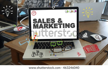 drawing icon cartoon with SALES AND MARKETING  concept on laptop in the office , business concept