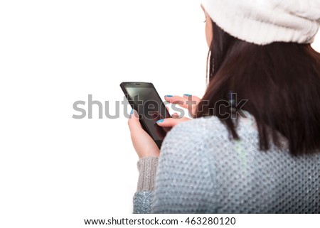 isolated woman hand holding the phone tablet touch computer gadget.