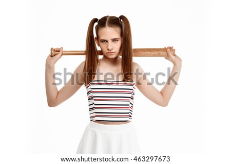 Young pretty girl posing with bat, isolated on white background.