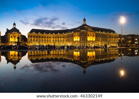 Bordeaux, France, Illuminated Reflection In Water At Place De La Bourse Against Sky