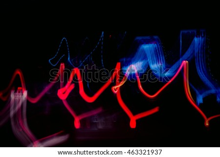 Abstract image of night lights in the city with motion blur.