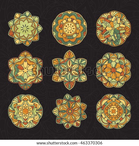 Set of hand drawn medallion colorful lace pattern on black background. Ethnic colored decorative mandala. Elegant motif for save the date card, greeting card, wedding invitation. Vector illustration.