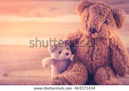 Two bears on wood background,vintage style