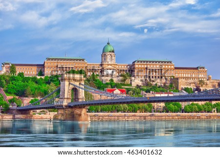 Budapest Royal Castle and Szechenyi Chain Bridge at day time from Danube river, Hungary. Royalty-Free Stock Photo #463401632