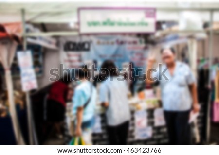 The trade fair, booth selling cheap goods from the manufacturer. A game show and giveaways. Abstract blur