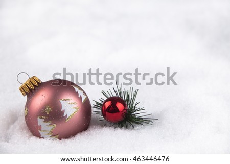 Christmas ball in the snow for a Christmas tree