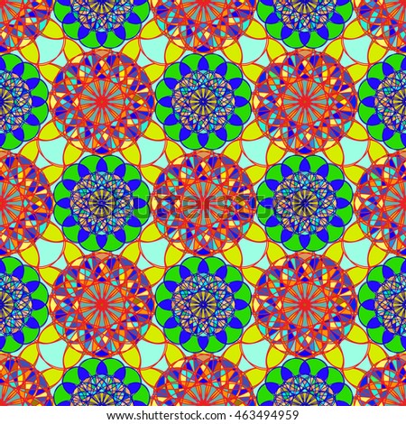 Beautiful coloful stained glass kaleidoscope on a background of leaves seamless pattern for design.