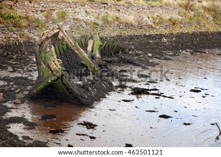 A wreckage of an abandoned ship anchored in Bowling. Scotland
