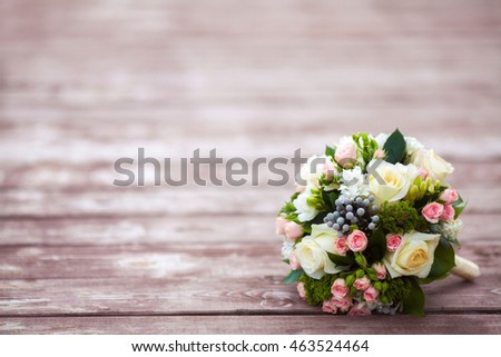 Beautiful wedding bouquet on vintage wooden background, copy space. Marriage concept
