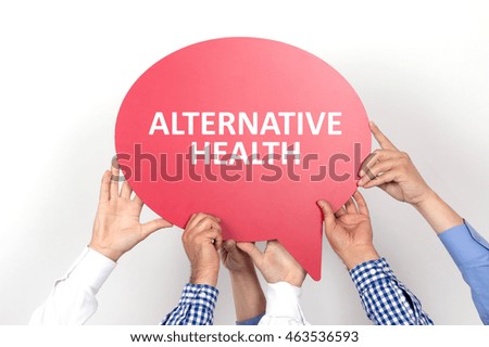 Group of people holding the ALTERNATIVE HEALTH written speech bubble