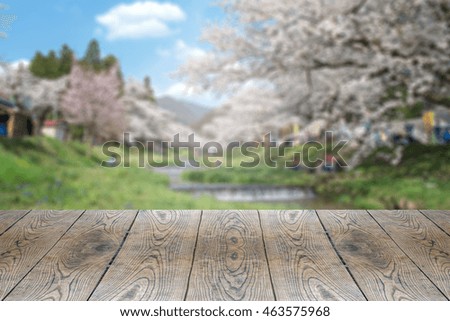 Perspective wood with blurred people activities in park background, product display montage, spring and summer season.
