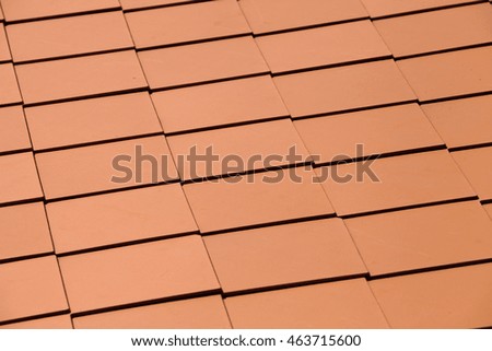 Red tiles roof background.
