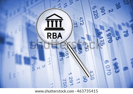 Magnifying lens over background with building icon and text RBA, with the financial data visible in the background. 3D rendering.