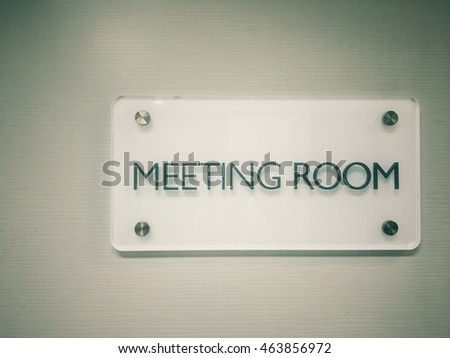 The meeting room white sign on the wall with copy space