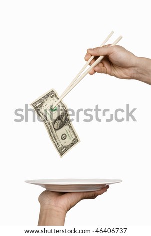 Chopstick taking dollar