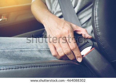 Fasten the car seat belt. Safety belt safety first Royalty-Free Stock Photo #464088302