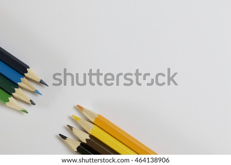 Colored pencils. Located sharpened part of each other. On a white background.