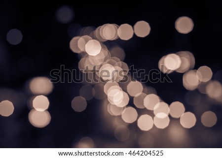 Abstract christmas lights or Vintage light sepia bokeh.	