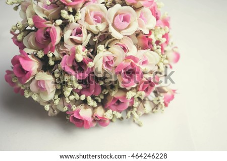 Vintage roses on white background. Place for text., select focus, blur background