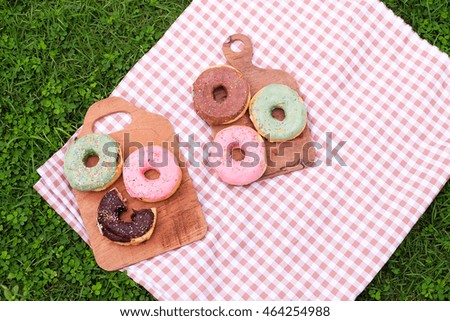 summer vacation with donuts on tray wood.