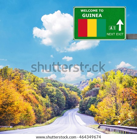 Guinea road sign against clear blue sky
