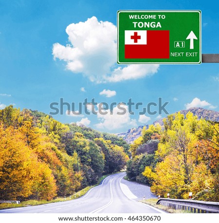 Tonga road sign against clear blue sky