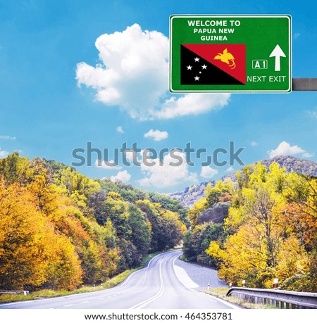 Papua New Guinea road sign against clear blue sky
