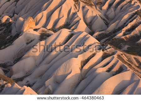 Volcanic formations looking like sand dunes in Cappadocia, Turkey.