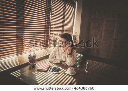 Attractive business woman making phone call
