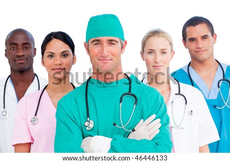 Portrait of multi-ethnic medical team against a white background