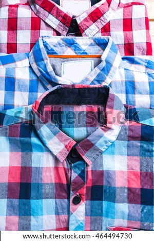 shirts plaid in plan with wooden background