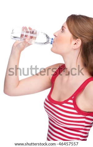 Full isolated studio picture from a young woman drinking some water