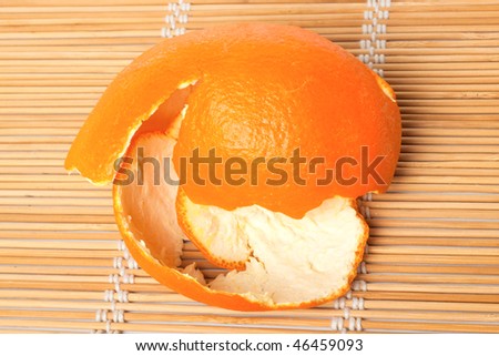 Mandarins rind isolated on straw mat